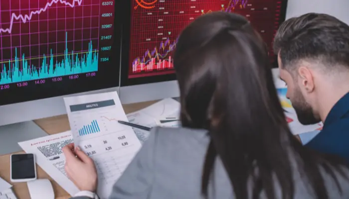 Colleagues analysising business data